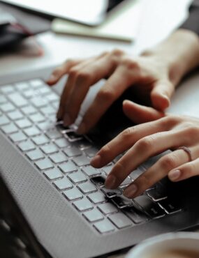 Close up of woman working on computer