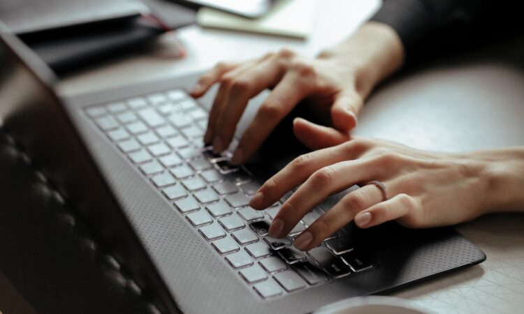 Close up of woman working on computer