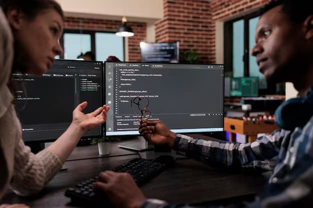 Two programmers arguing near the computer